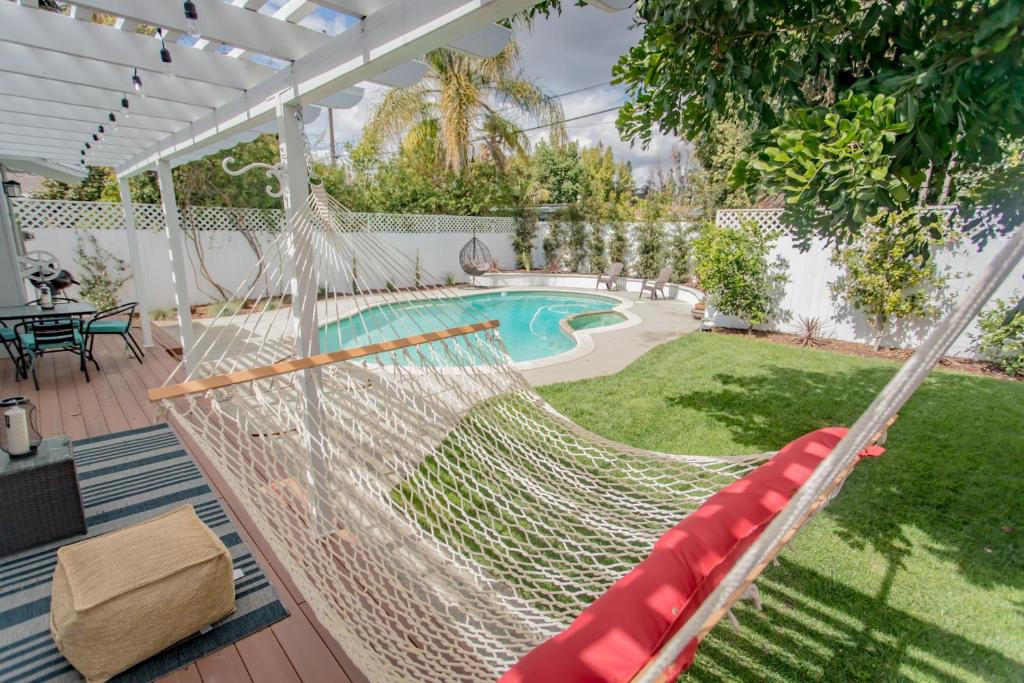 Enchanting Sherman Oaks Home With Pool permit #HSR two one zero zero 2605 image