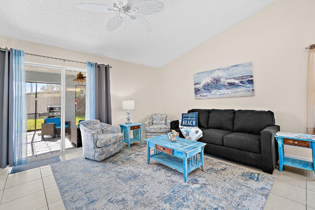 Serene Seaside Retreat - Dog friendly - 2BR Townhouse with Heated Pool Steps to Paradise Beach! photo 1