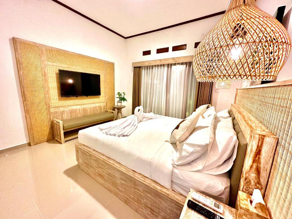 Canggu Bali Villa by JIWA Hotels - Tap to explore photos