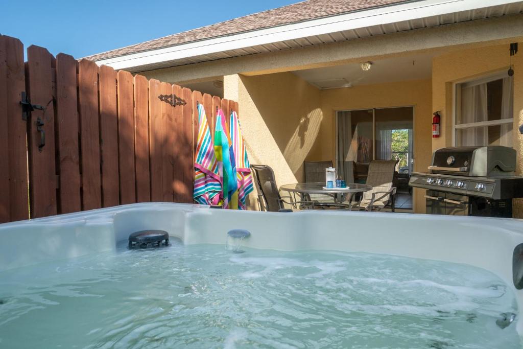 Heart of the Waves - 3BR & 2BA Beach Retreat - NEW HOT TUB - Outside Patio with Grill & Seating, Steps to Fun! photo 2