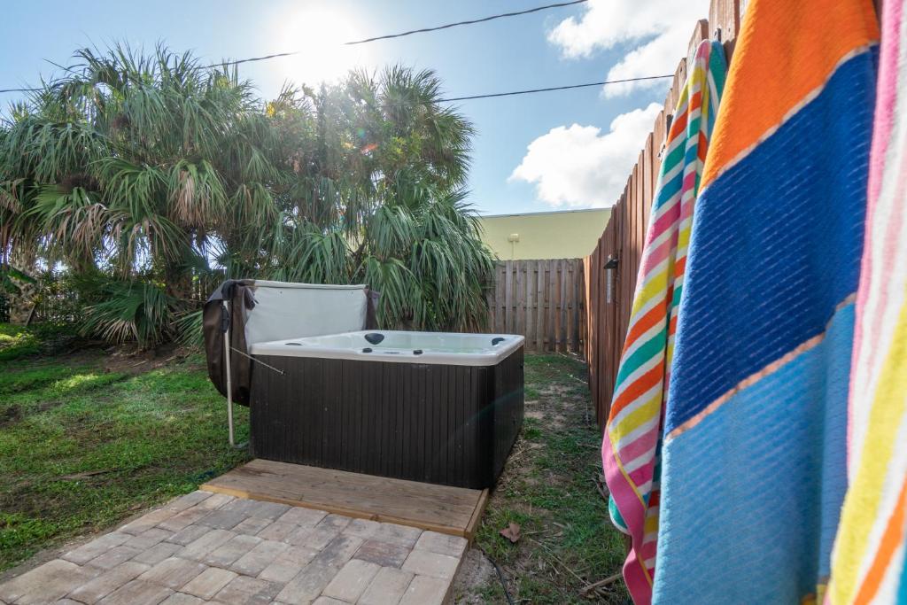 Heart of the Waves - 3BR & 2BA Beach Retreat - NEW HOT TUB - Outside Patio with Grill & Seating, Steps to Fun! photo 4