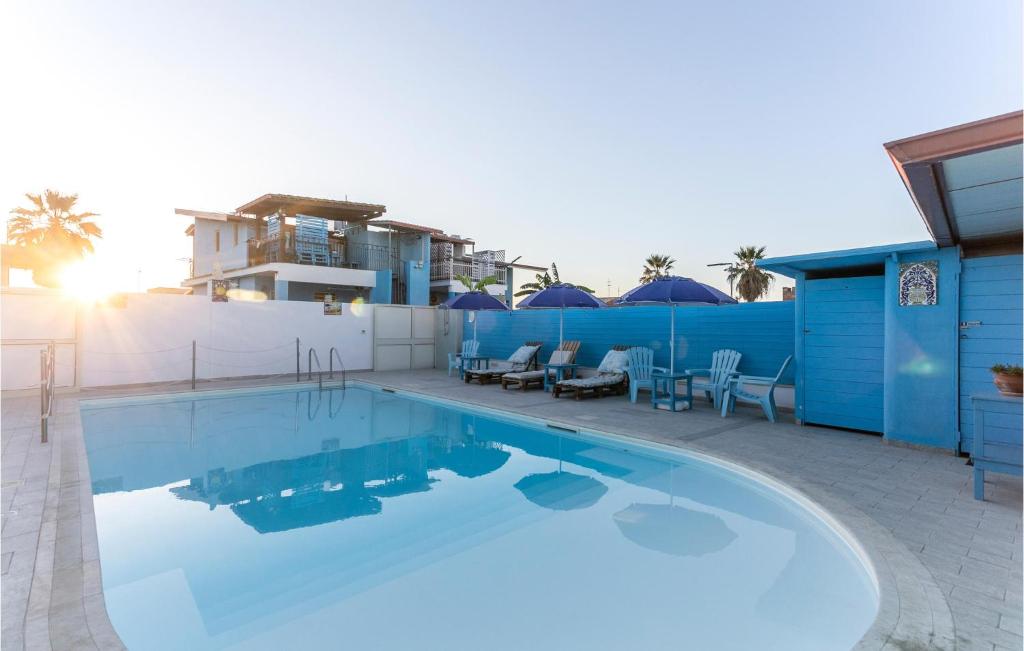 Nice Apartment In Ispica With Outdoor Swimming Pool, Wifi And 3 Bedrooms