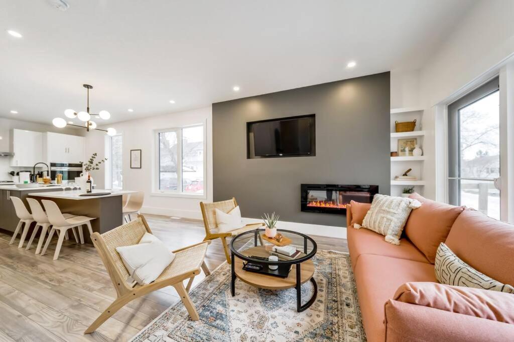 Chic Retreat, 4BR Near DT & WEM, Fireplace, Trails, Sleeps 10! photo 1