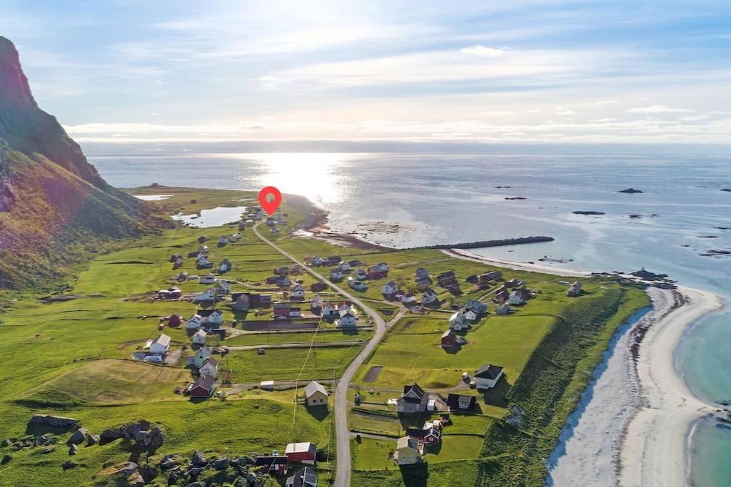 House by the ocean with midnight sun view