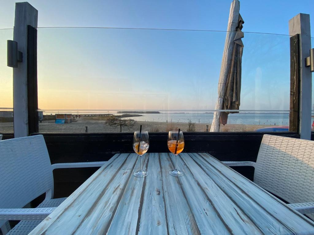 GREEN VILLA in bester Lage - Dachterrasse mit Meerblick - großer eingezäunter Garten - kinderfreundlich - Hunde inklusive - 4 Sterne Resort - direkt am Strand - Pool inklusive photo 1