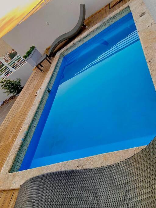 Apartamento lujoso en piso #10, zona centrica, picuzzi, hermoso paisaje, a 30 minutos de la playa y del aeropuerto internacional de las Américas photo 2