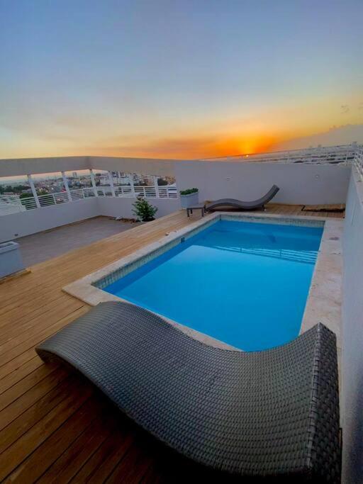Apartamento lujoso en piso #10, zona centrica, picuzzi, hermoso paisaje, a 30 minutos de la playa y del aeropuerto internacional de las Américas photo 3