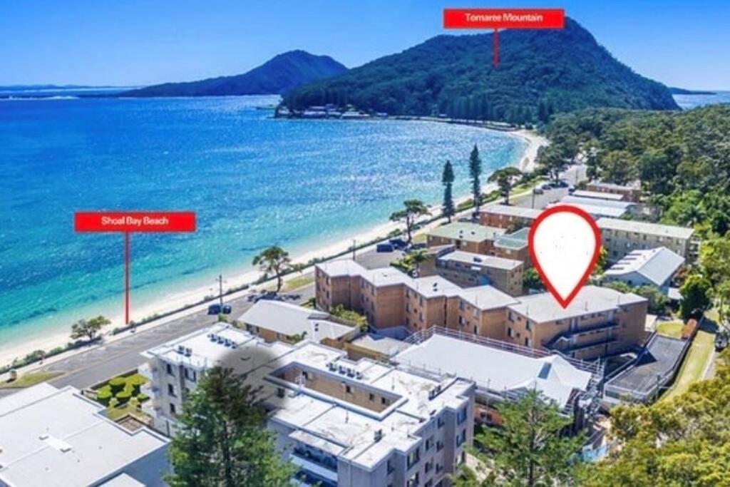 Sparkling water views over Shoal Bay beach photo 2