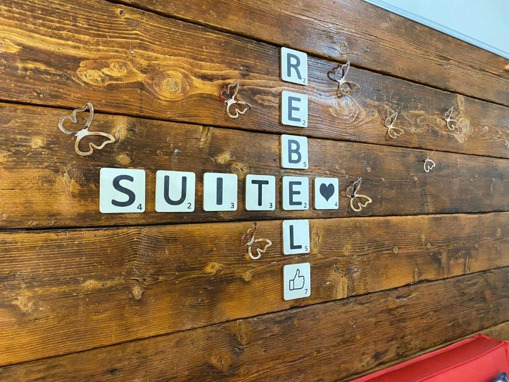 REBEL SUITE cross photo 1