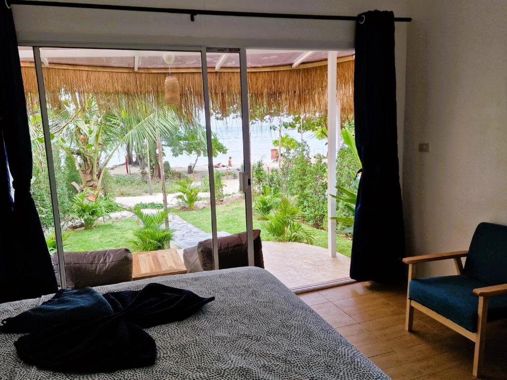 Secret Beach Bungalows - Tap to explore photos