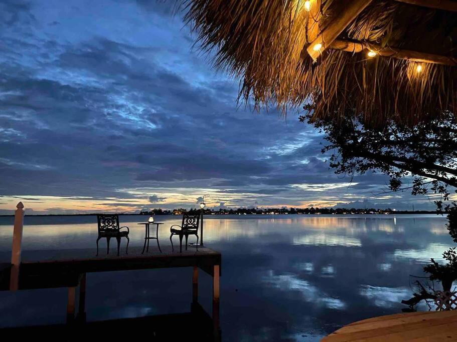 Oceanfront villa with private beach, heated pool, tiki and boat dock photo 2