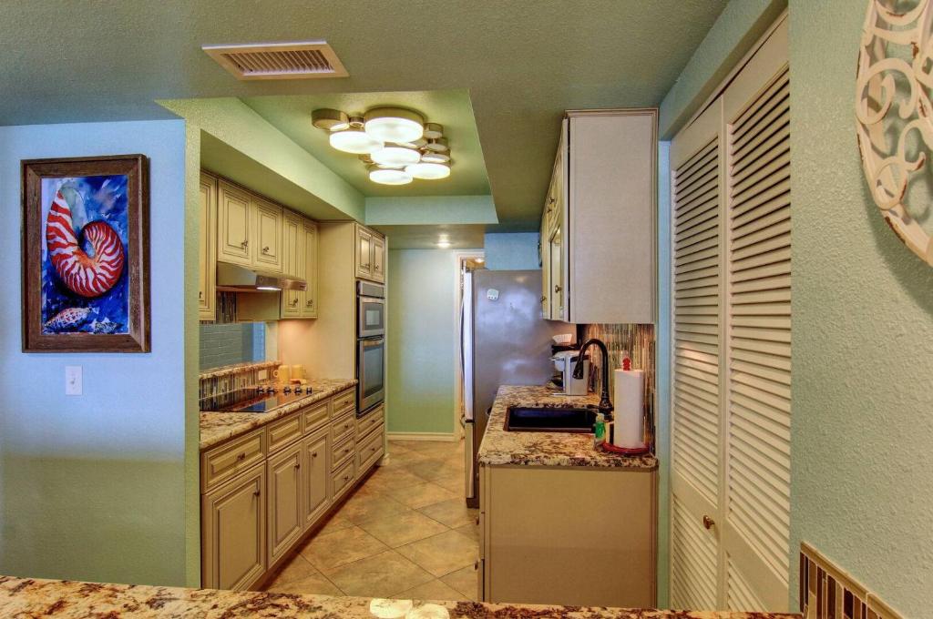Watch the Sunrise Over the Gulf from Your Private Balcony in This 2 Bedroom 2 Bath photo 3