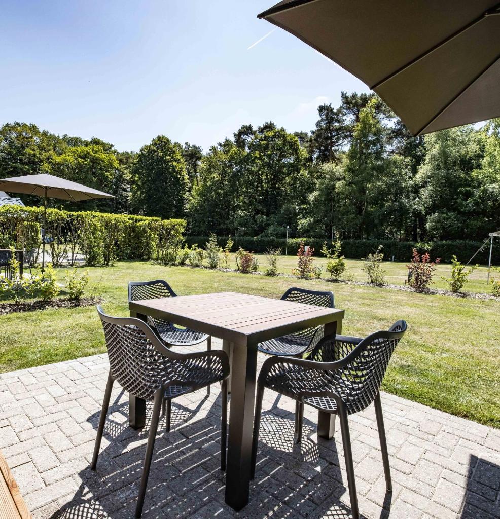 Luxe woodlodge in een prachtige en bosrijke omgeving photo 1