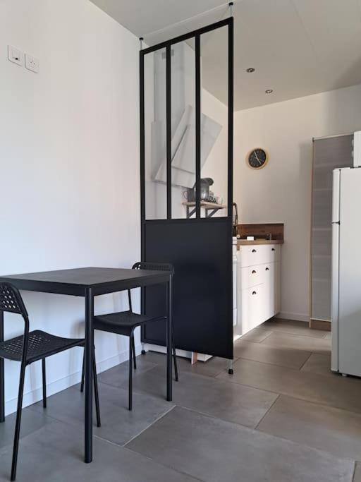 Studio dans maison avec jardin et balcon, au calme photo 1