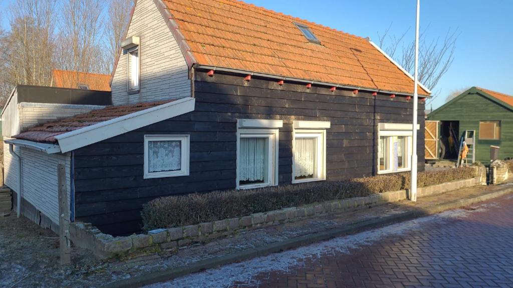 Schwone Diekhuusje - Vakantiewoning aan de Noordzeekust photo 1