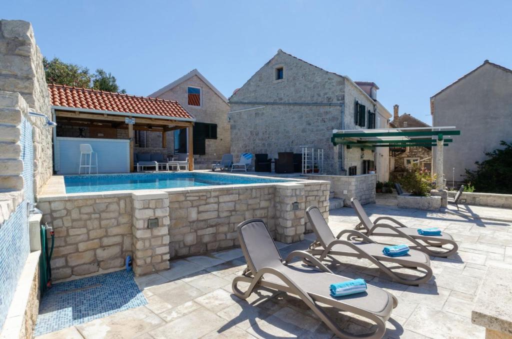 Traditional stone house with swimming pool photo 2