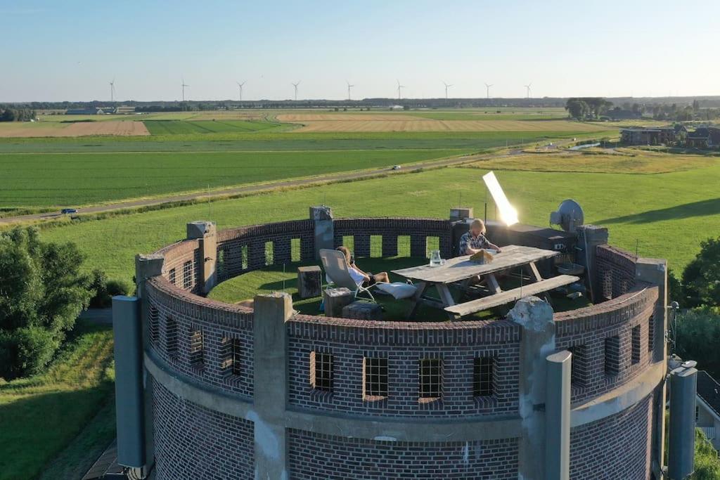 Verblijf boven in de watertoren van Strijen met dakterras photo 2