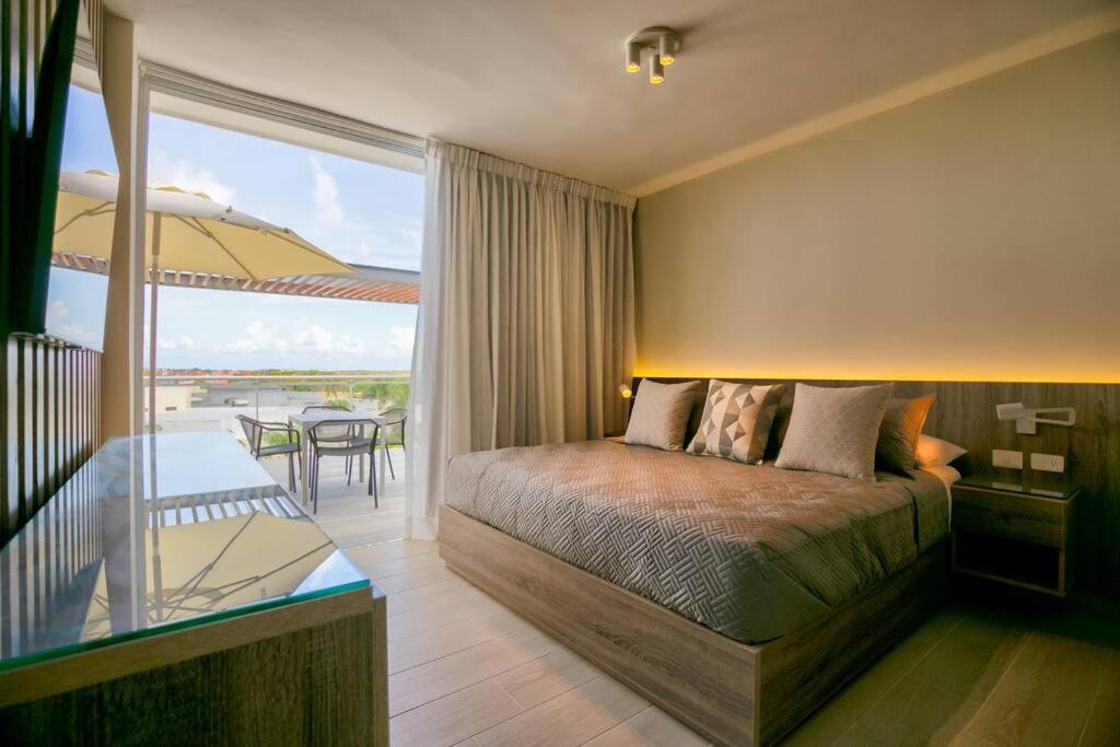 Amazing Apartment with Rooftop Jacuzzi at Bayahibe - Vibe Residences 3BDR photo 4