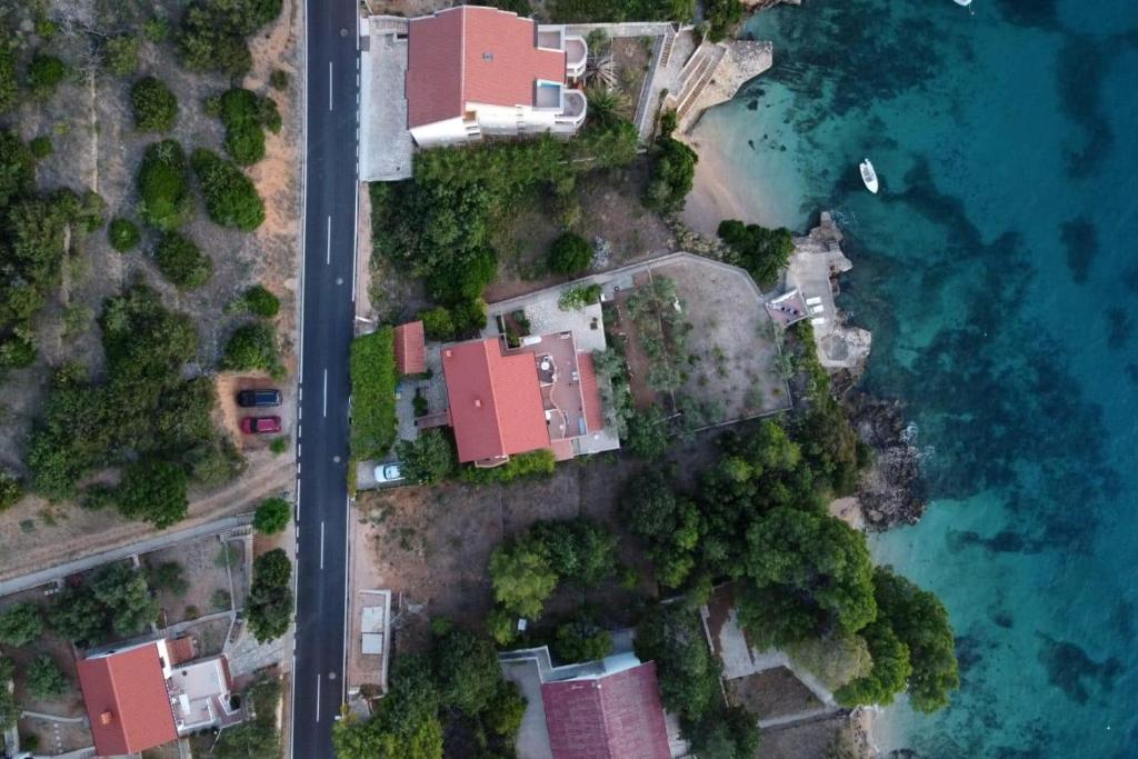 Apartments by the sea Stara Novalja, Pag - 13938 photo 1