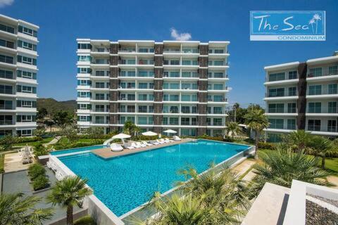 The Sea Condominium - Tap to explore photos