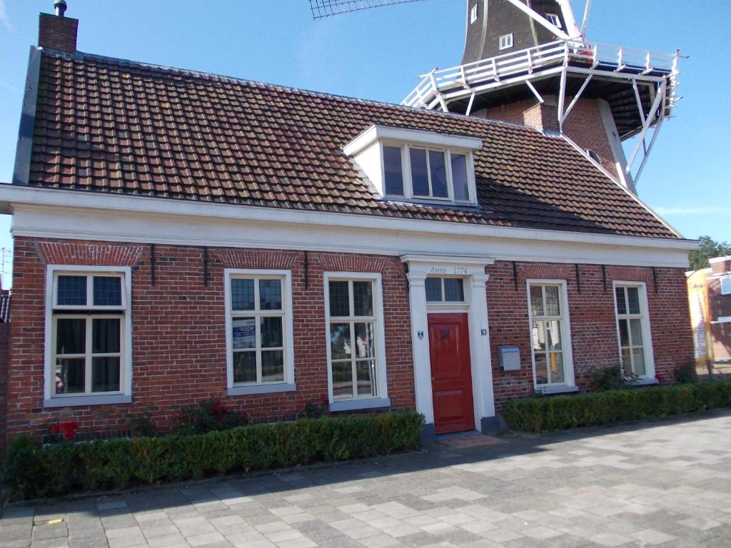 Zeer sfeervol gastenverblijf in Het Molenhuisje met woonkamer en keuken photo 1