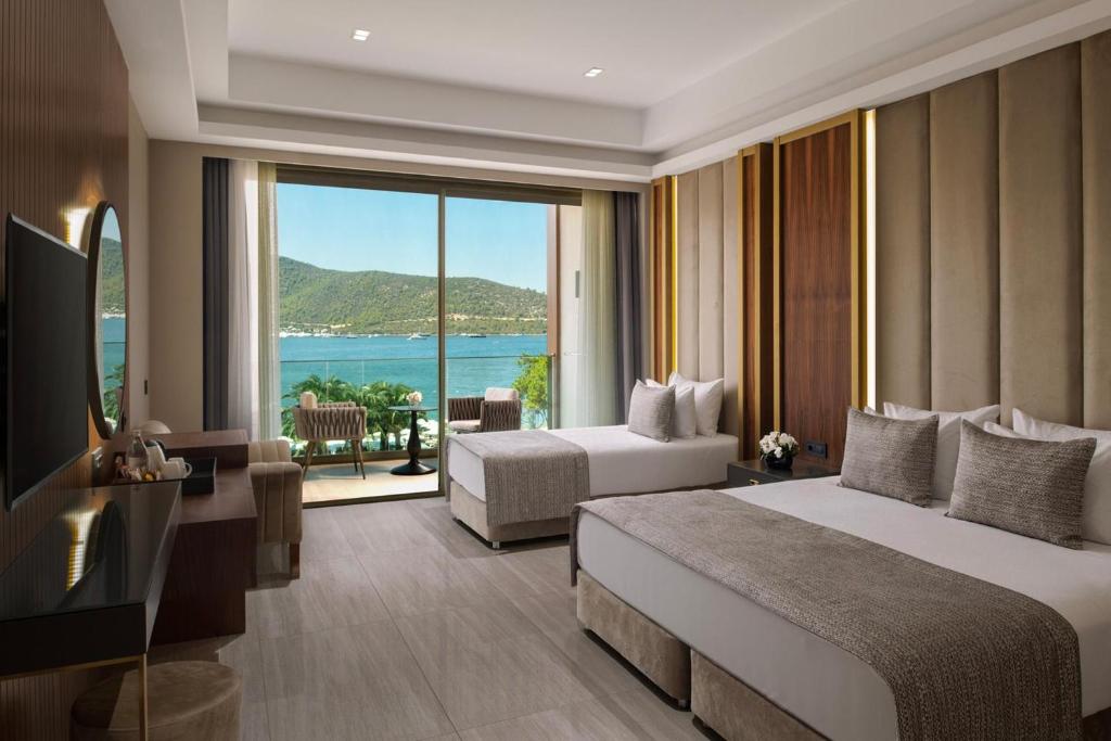 Vogue Hotel Supreme Bodrum - Tap to explore photos