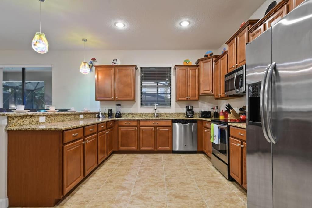 The Magic Mansion 6BR Resort Pool Home Near Disney photo 3