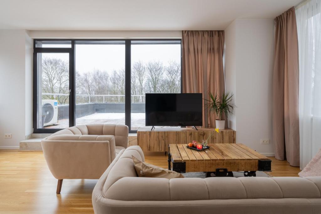 1-bedroom penthouse with underground parking - Tap to explore photos