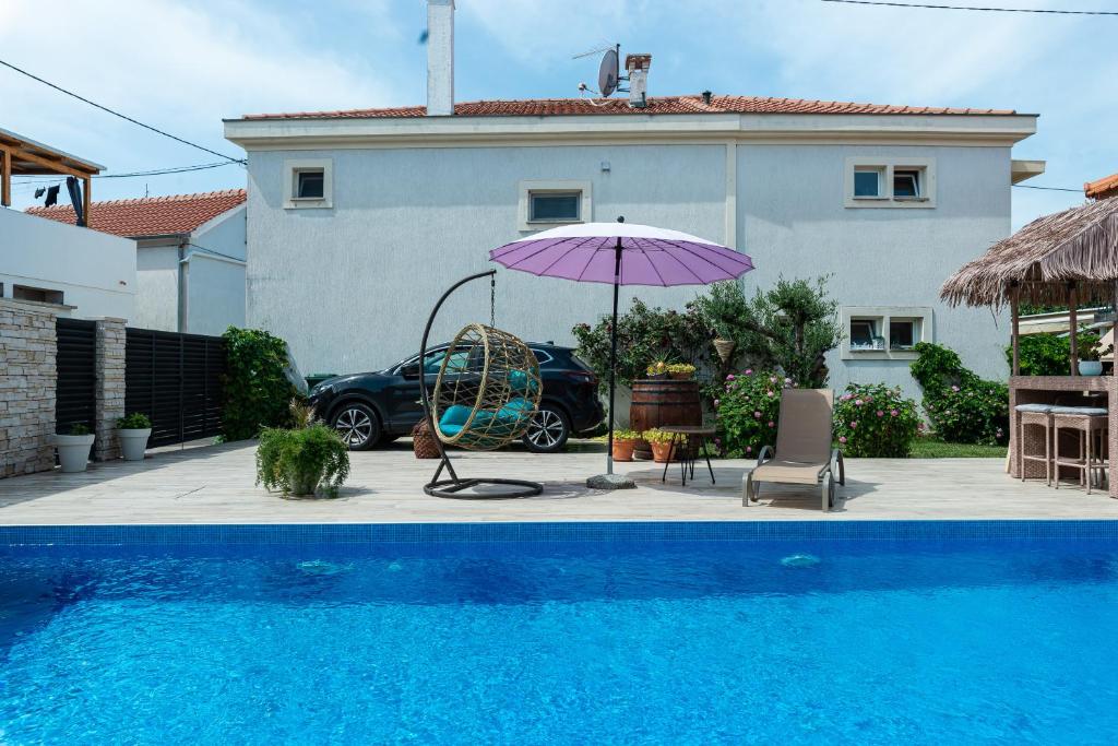 NEW! Beachfront Holiday home Delight with private pool photo 4