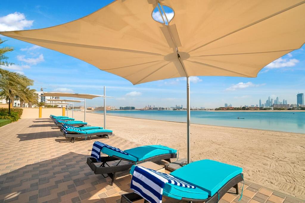 FAM Living - Sarai Apartments - Private Beachfront Escape in Palm Jumeirah photo 1