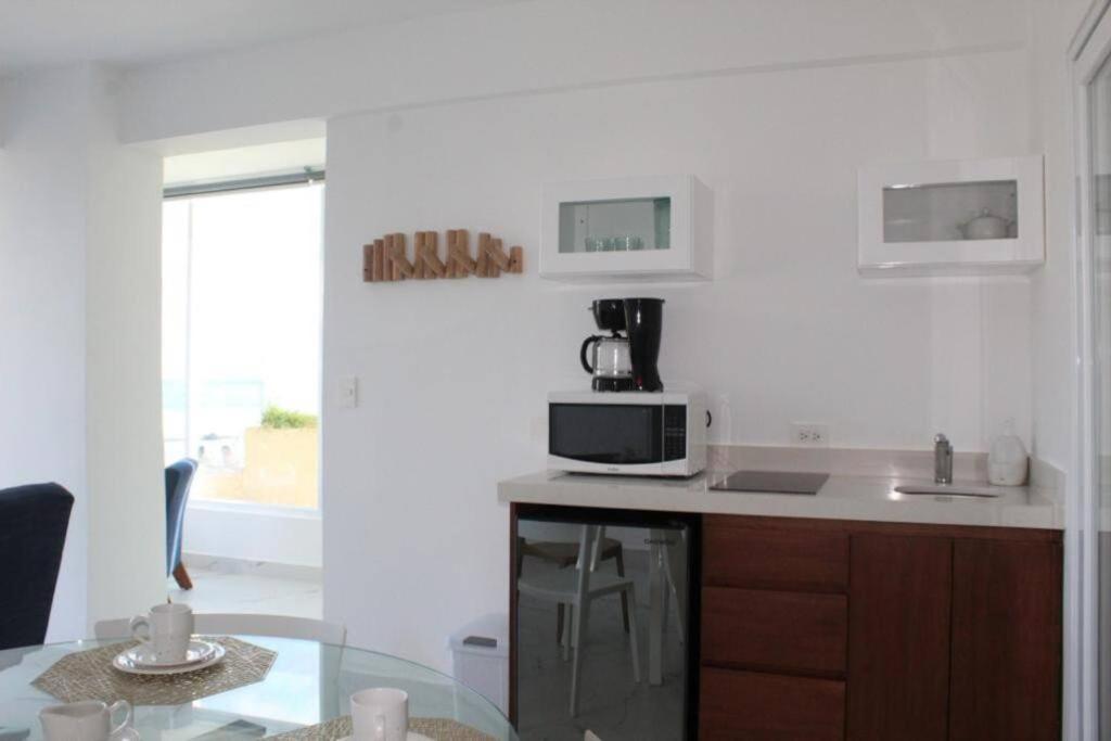 Beach Front Renewed Apartment - Tap to explore photos