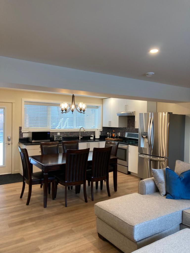 Bright poolside walkout two bedroom basement suite in the Okanagan photo 3