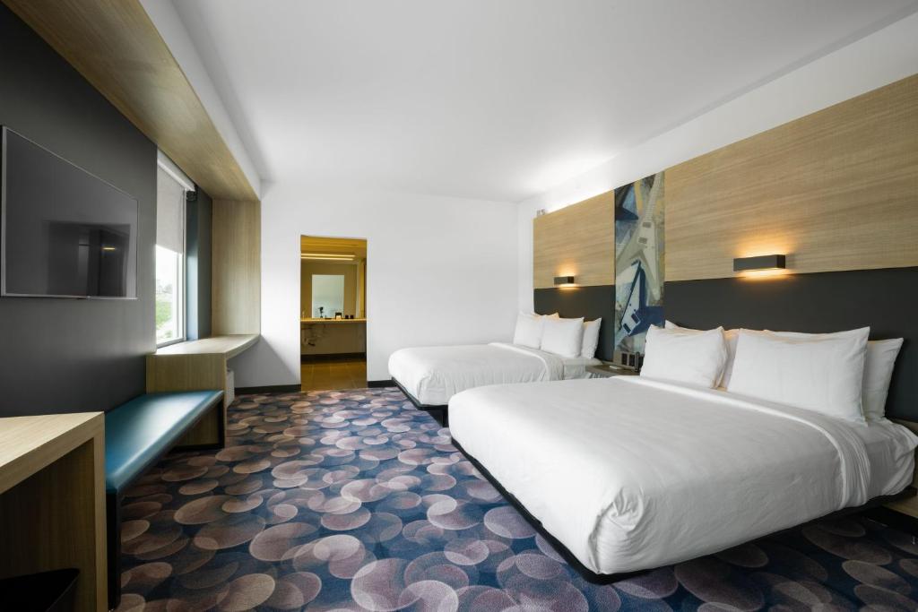 Aloft Austin Airport by Marriott - Tap to explore photos