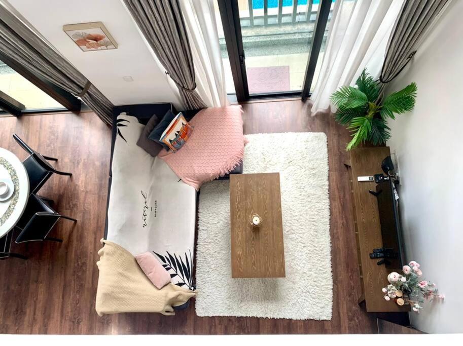 [Nine'suite] @ Riverson Soho - Duplex 2BR Poolview photo 2