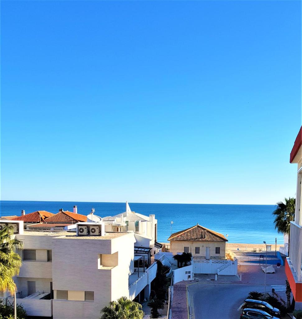 3 bedrooms appartement at Tavernes de la Valldigna 50 m away from the beach with sea view furnished terrace and wifi photo 1