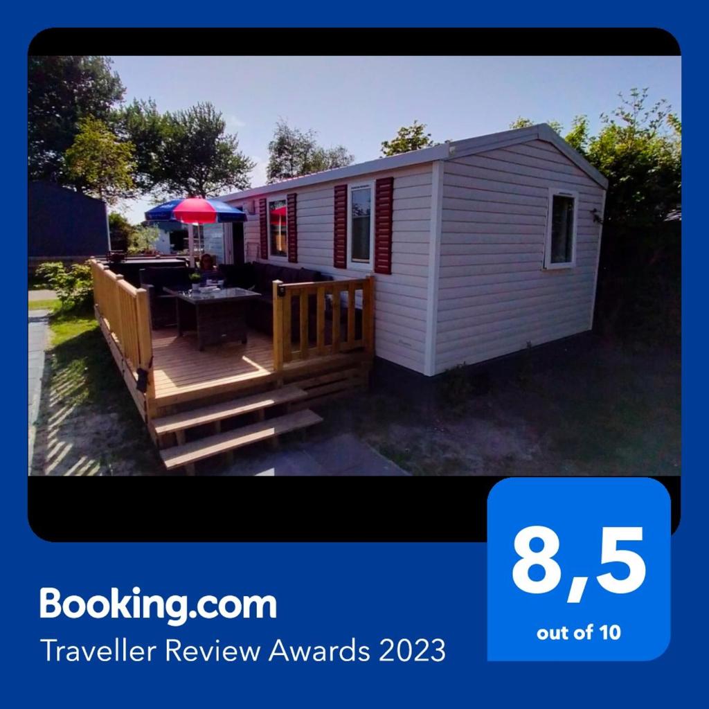 BJ Chalets - Robbengat 68 - Gezellige, kindvriendelijke chalet op vakantiepark Lauwersoog! Vroege incheck! photo 1