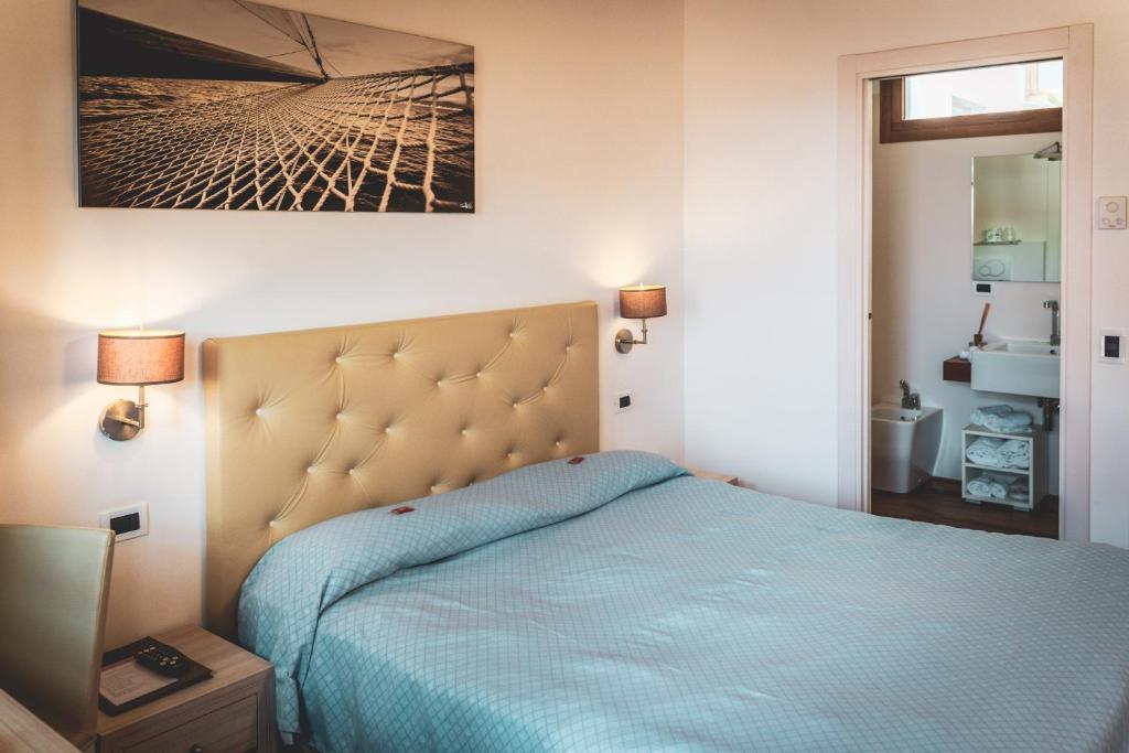 Tre Merli Beach Hotel - Tap to explore photos