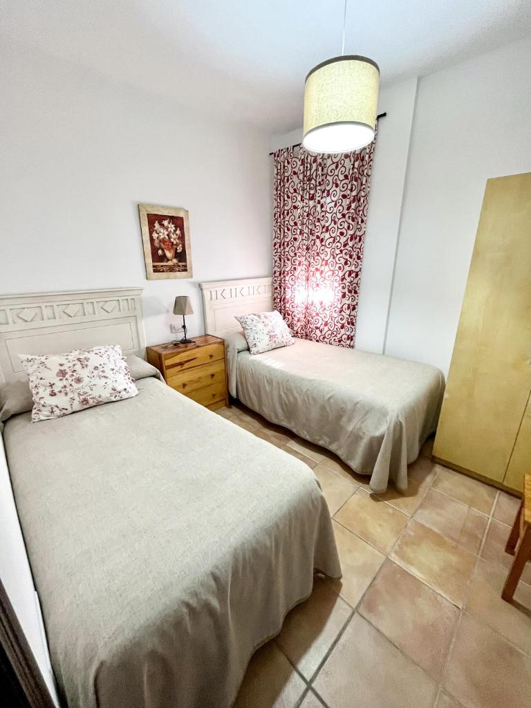 Apartamentos Villa Torcal - Tap to explore photos