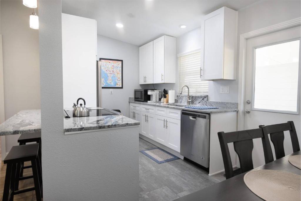 Main Attraction is a Renovated 3 BR Pet Friendly Home with Fenced Yard just Minutes Away From Busch Gardens & USF image