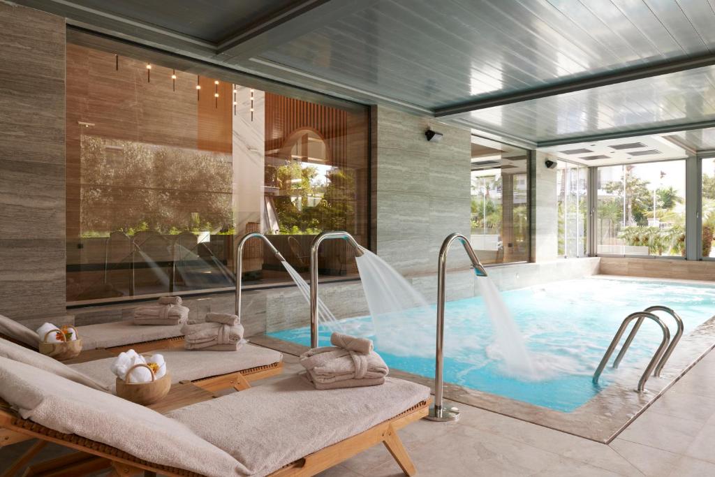 Dusit Suites Athens - Tap to explore photos