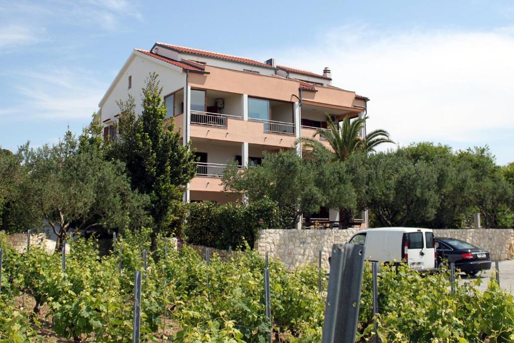 Family friendly apartments with a swimming pool Povljana, Pag - 244 photo 1