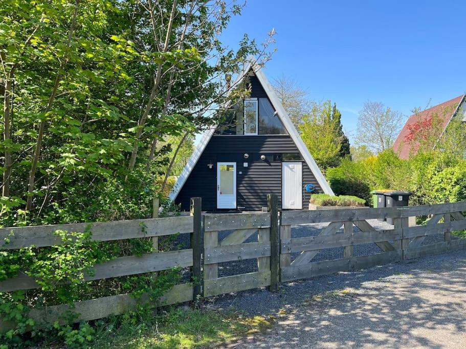 Achthoek 51, Nieuw ingericht vrijstaand vakantiehuis op 920m2 photo 3