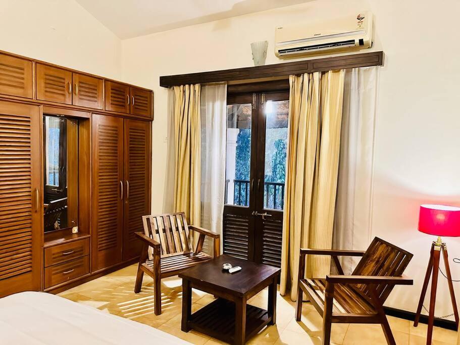 Waterfront Beach Villa In Baga with Private Pool photo 1