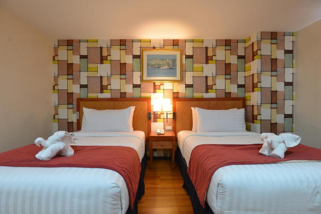 Royal Suites Condotel - Tap to explore photos