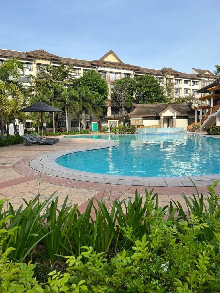 Ri's One Oasis w Free Pool back of SM City Mall photo 1