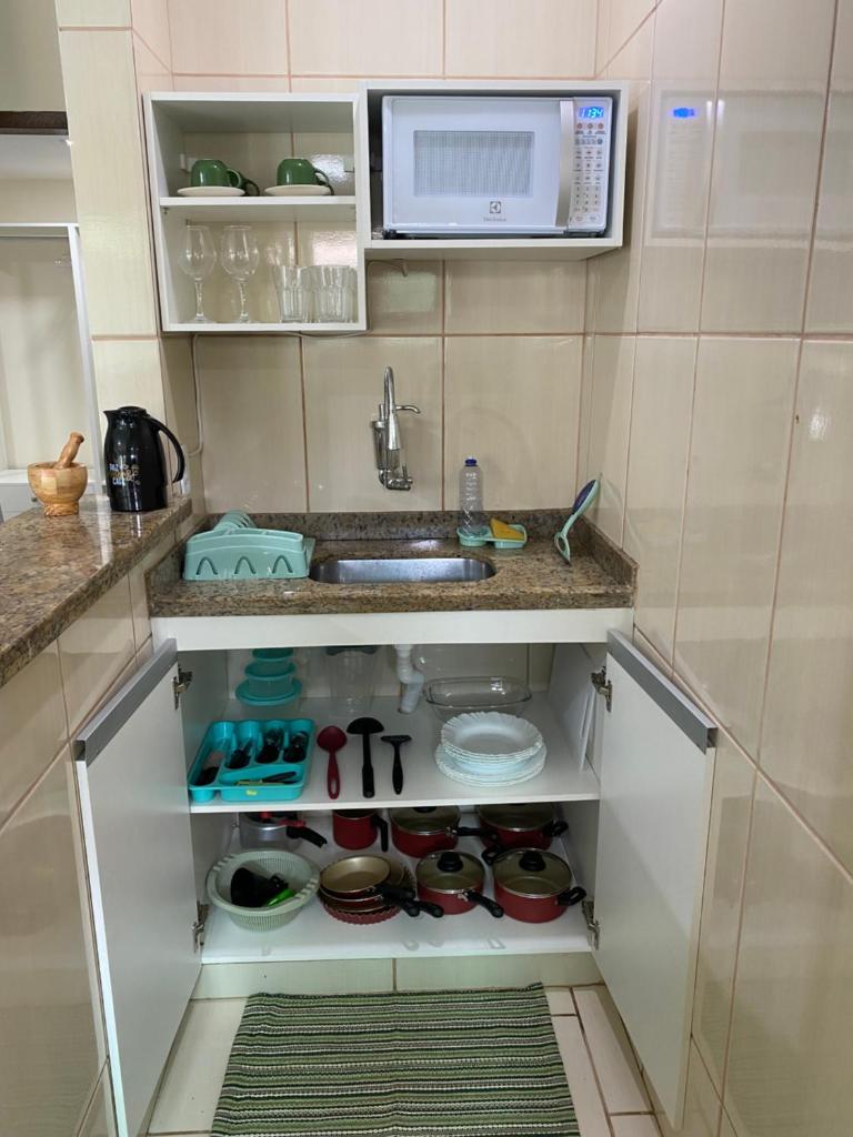 Casa aconchegante e charmosa à 6 min da Praia - Ar condicionado - WIFI 600MB - Netflix - Globoplay - Cozinha Completa photo 2
