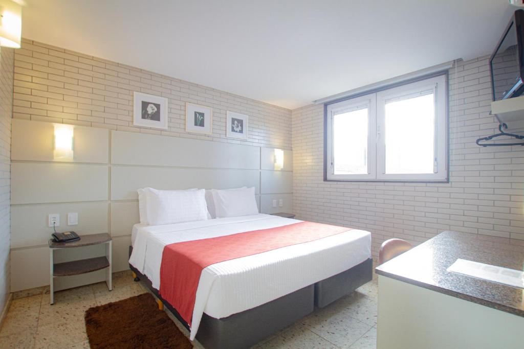 Hotel Confiance Prime Batel - Tap to explore photos