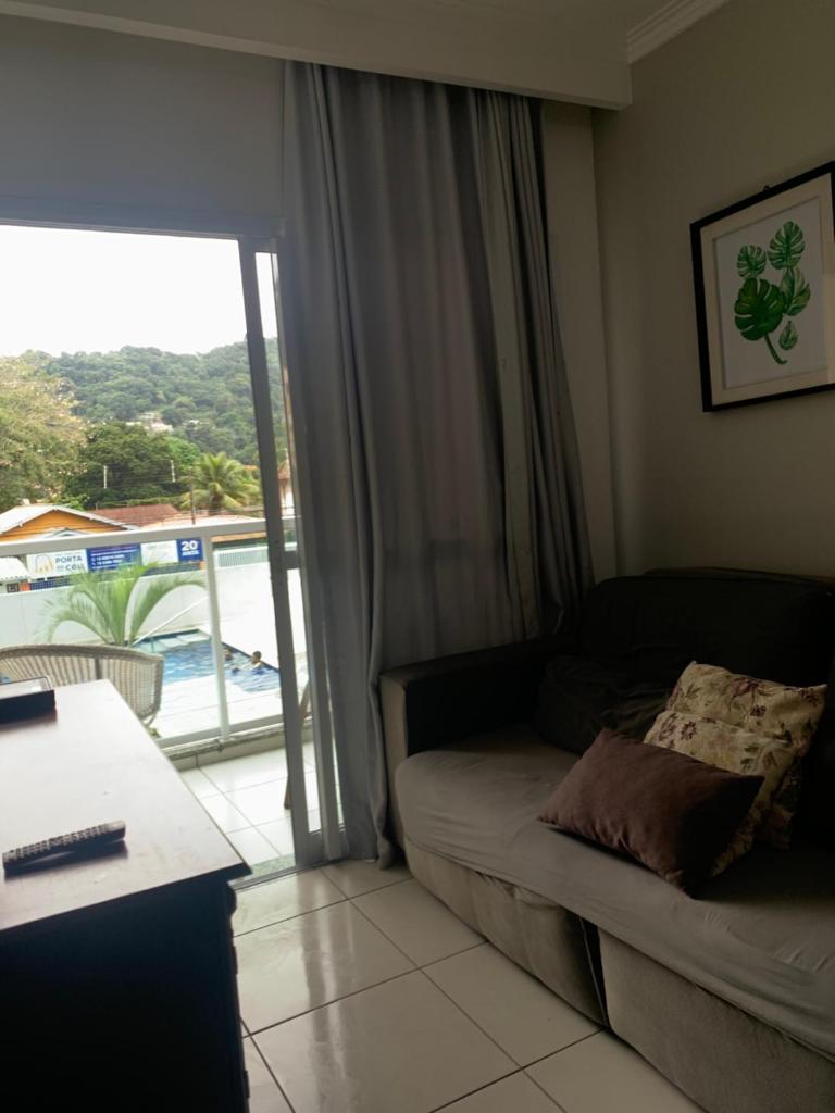 Apartamento 500m Praia da Enseada Guarujá varanda e vaga de garagem photo 2
