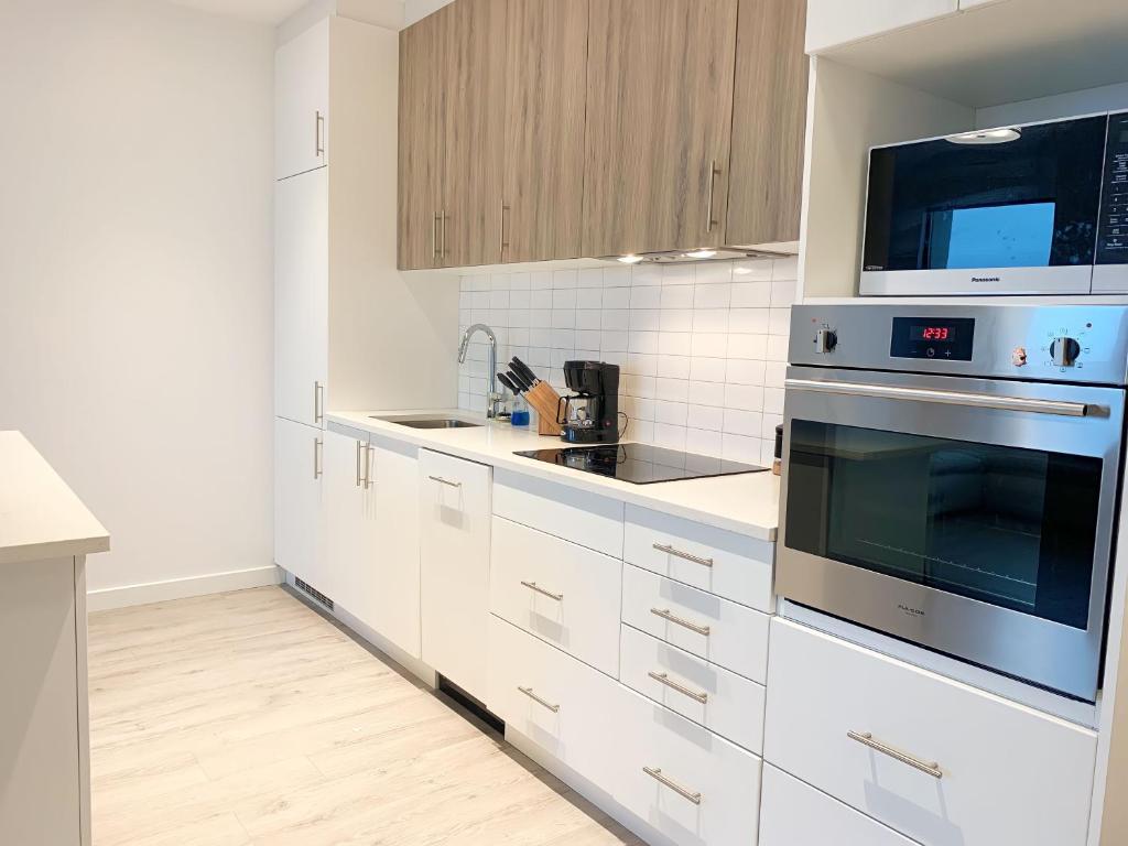 Cozy 1BR Condo w/ Insuite LDRY, Gym & Free Parking photo 4