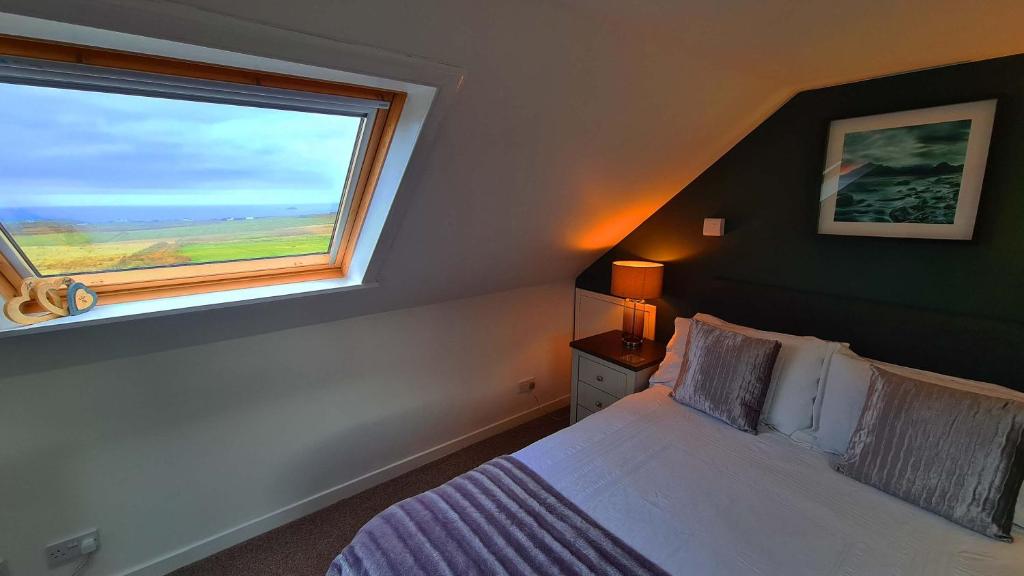 Fladda Chuain Holiday Home - Tap to explore photos